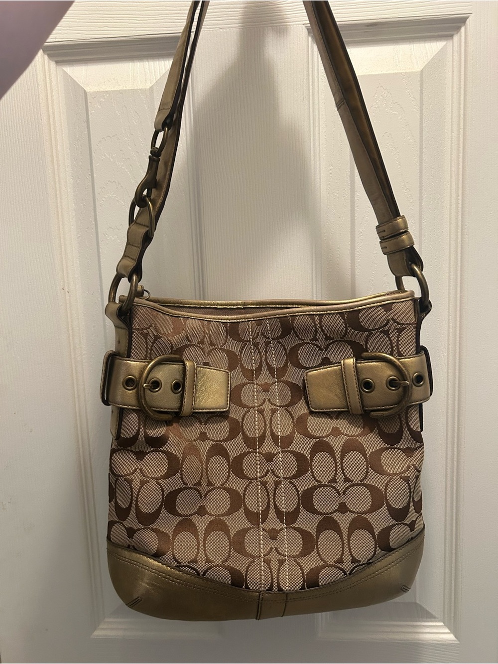 Coach Signature Soho Duffel in gold